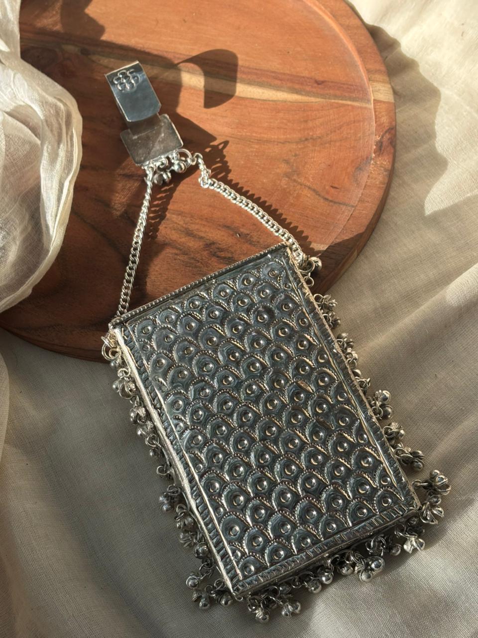 Filligree phone clutch