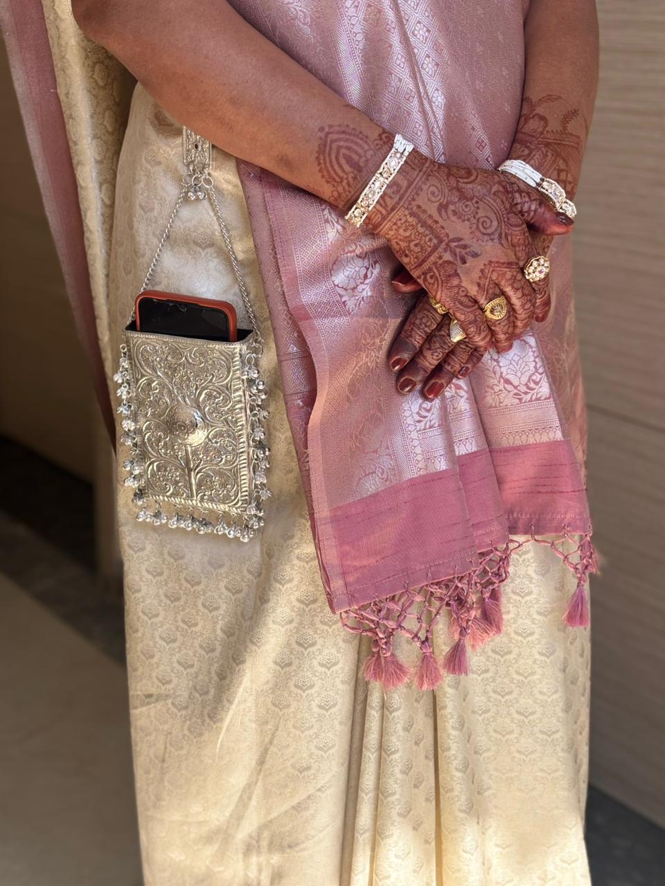 Filligree phone clutch